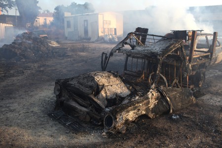 A burnt car after forest fire. Photo: KKL-JNF Photo Archive